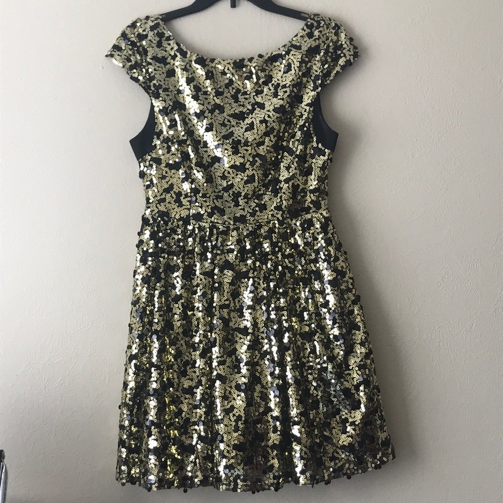 Black and gold sequin dress